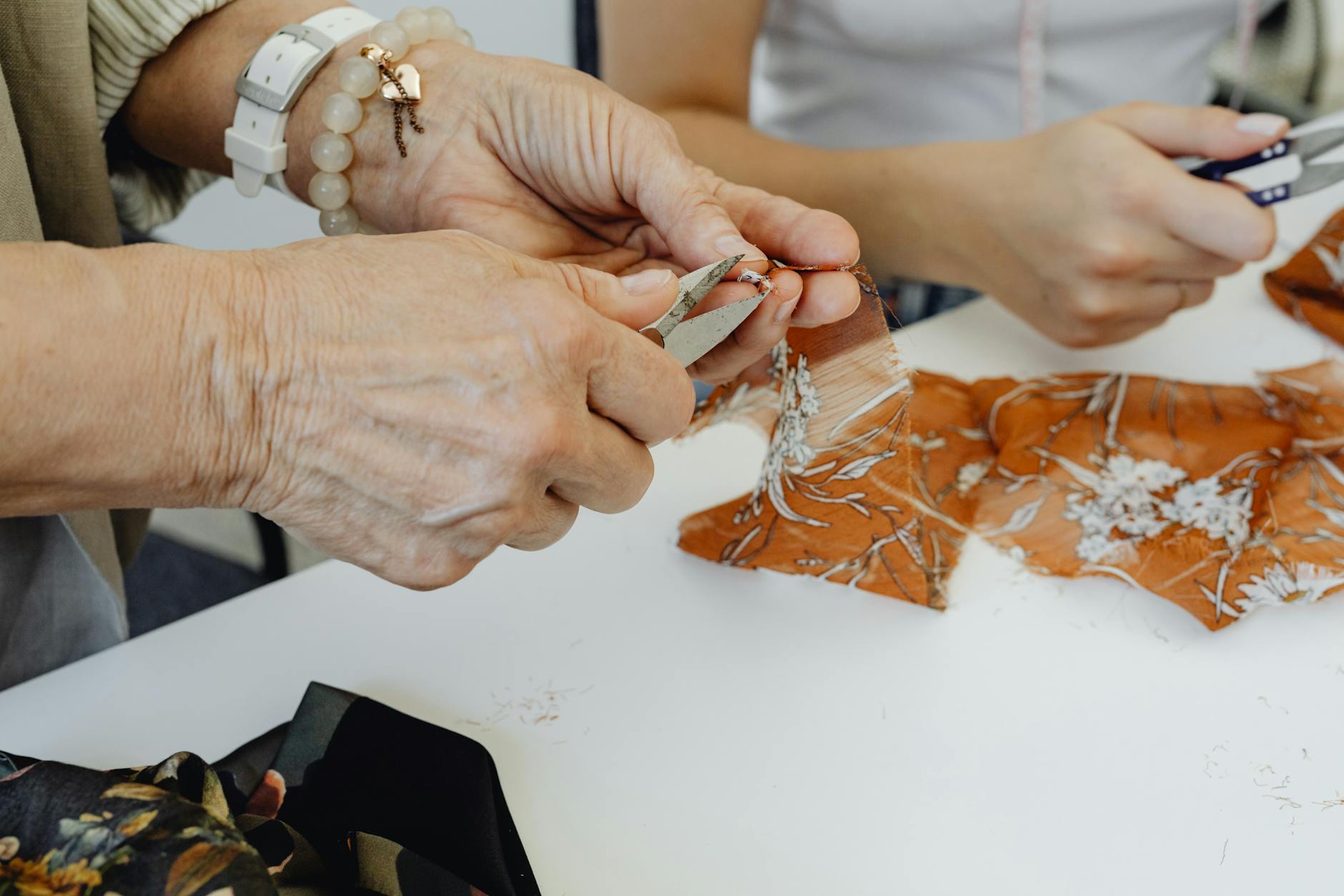 Expert tailor working on a bespoke garment